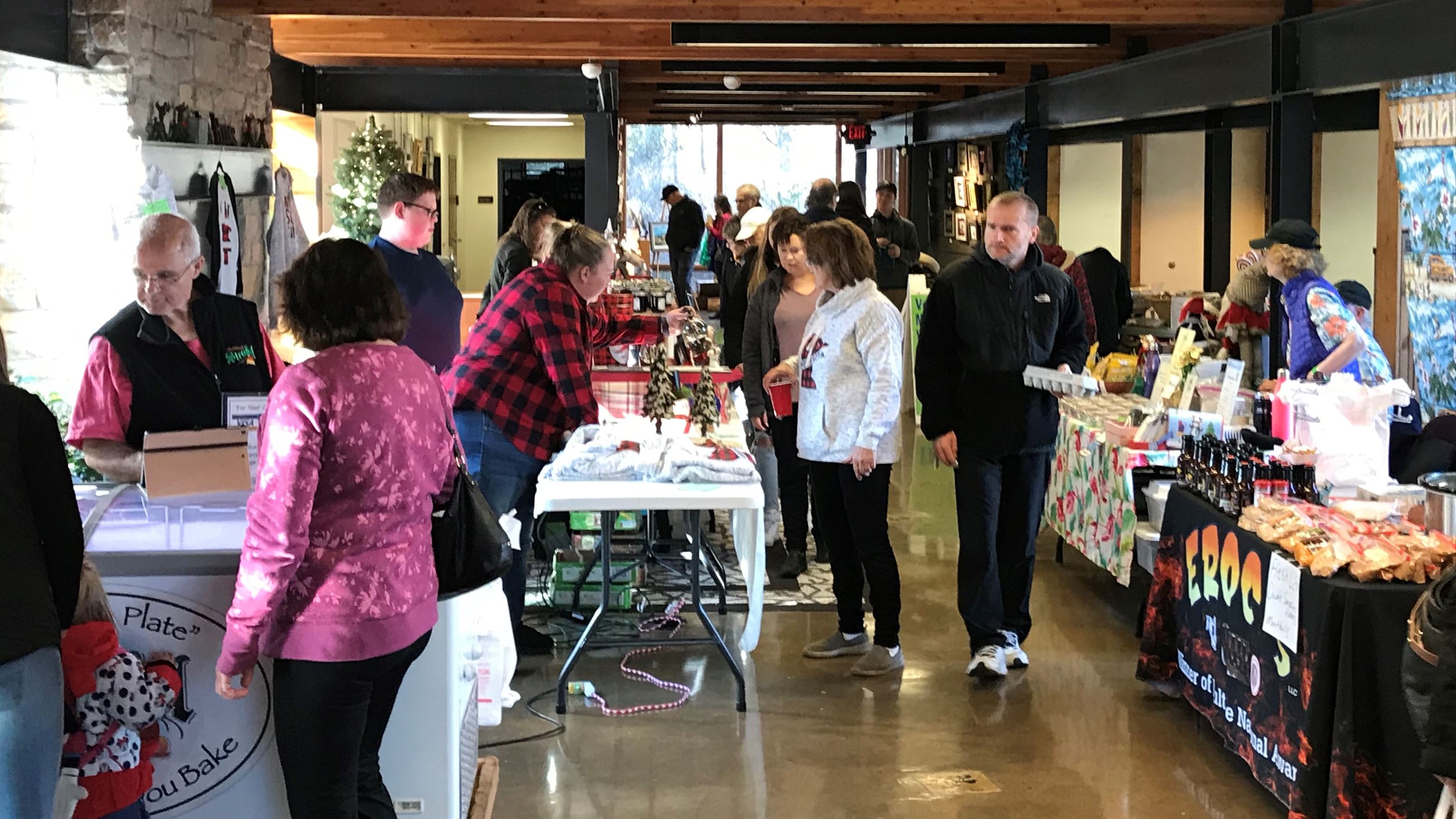 Shoppers and vendor booths
