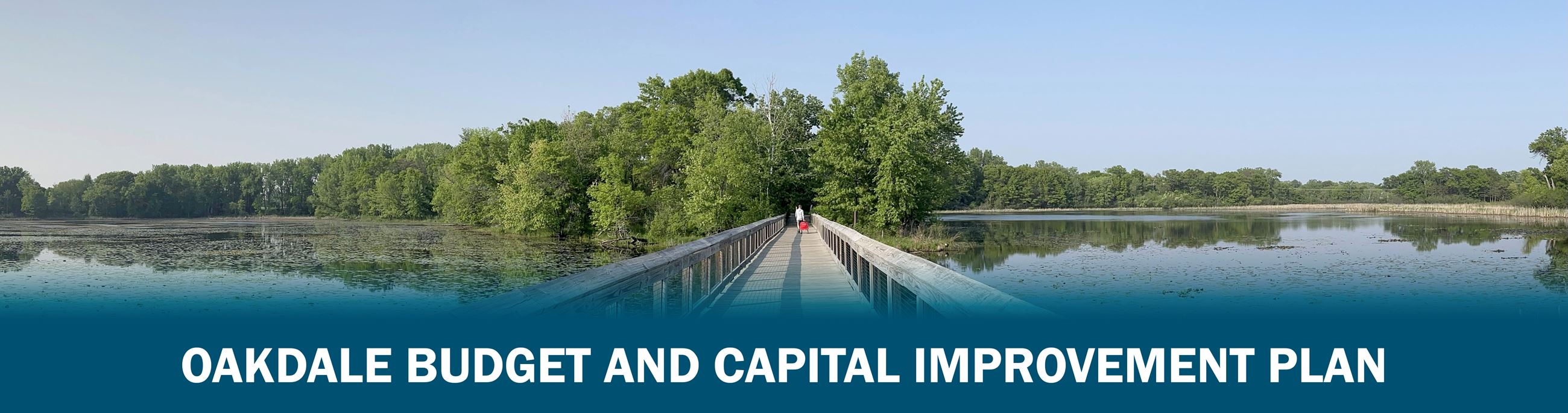 Panoramic image of Oakdale boardwalk, graphic text "Oakdale Budget and Capital Improvement Plan&#