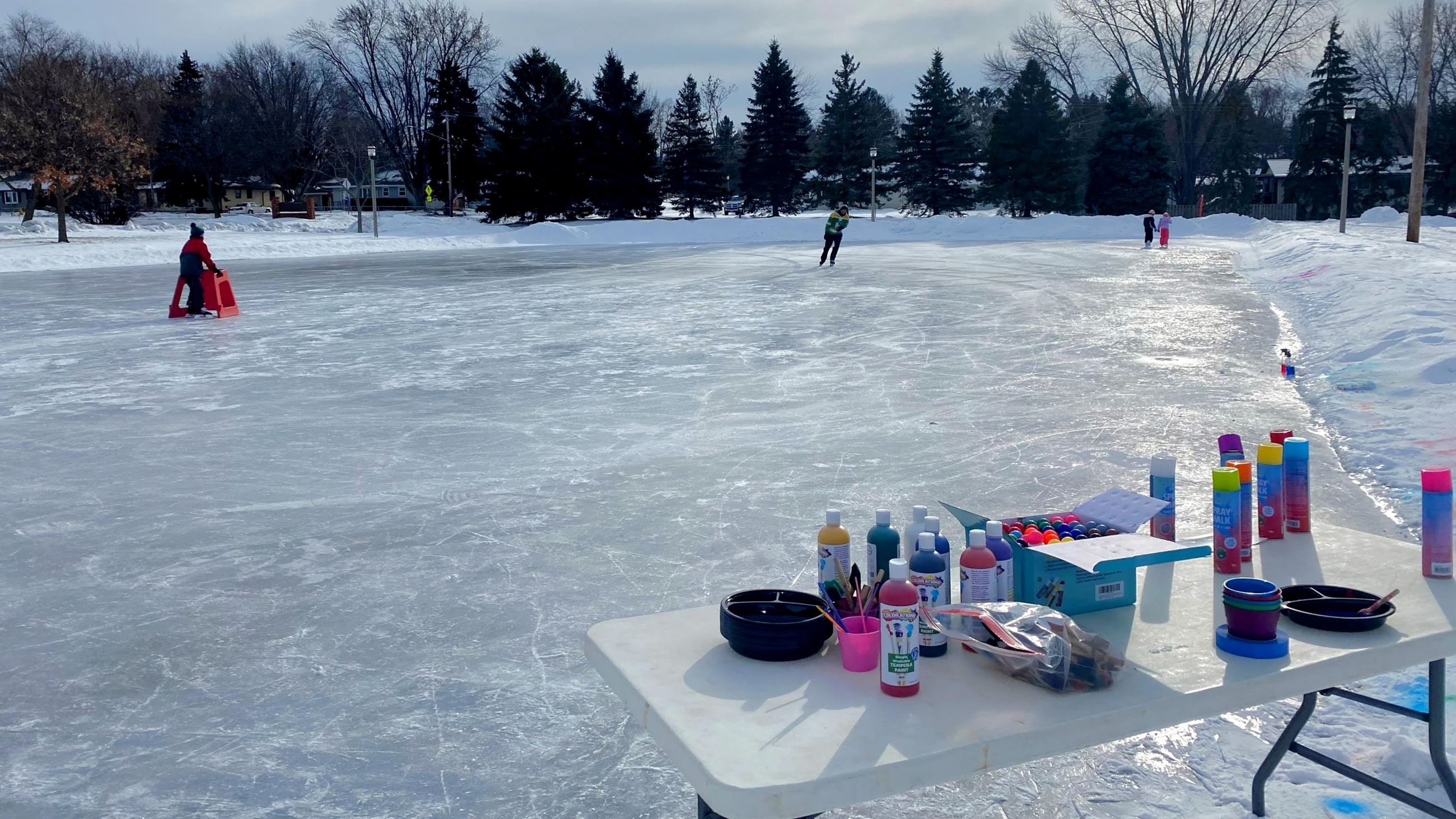 A table of paint staged at a pleasure ice rink